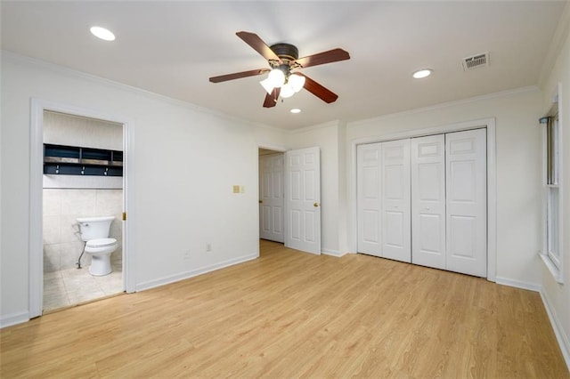 7500 Roswell Rd Unit 18, Sandy Springs, GA 30350 - unfurnished bedroom with crown molding, light wood finished floors, recessed lighting, a closet, and ensuite bath