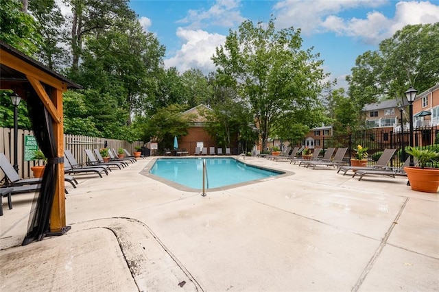 7500 Roswell Rd Unit 18, Sandy Springs, GA 30350 - community pool with a patio area and a residential view
