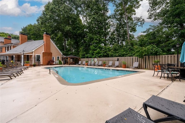 7500 Roswell Rd Unit 18, Sandy Springs, GA 30350 - community pool featuring a patio area