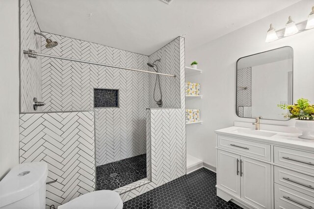 1286 Calhoun Ter SW, Atlanta, GA 30314 - bathroom with toilet, vanity, tile patterned floors, and a tile shower
