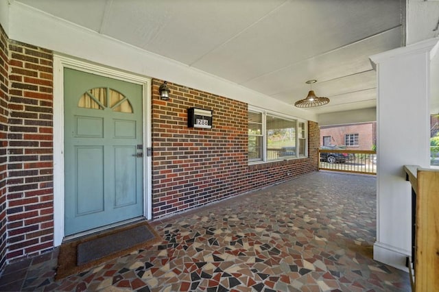 1286 Calhoun Ter SW, Atlanta, GA 30314 - view of exterior entry with brick siding and covered porch