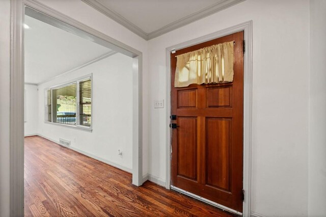 1286 Calhoun Ter SW, Atlanta, GA 30314 - entrance foyer featuring baseboards, visible vents, crown molding, and wood finished floors