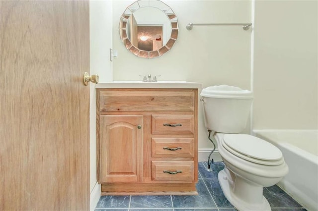 2211 Jonathan Ave, Lithonia, GA 30058 - full bathroom featuring toilet, vanity, and baseboards