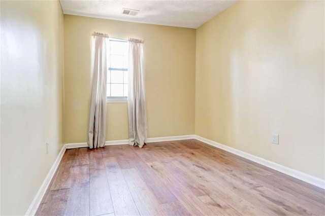 2211 Jonathan Ave, Lithonia, GA 30058 - spare room with hardwood / wood-style flooring and baseboards