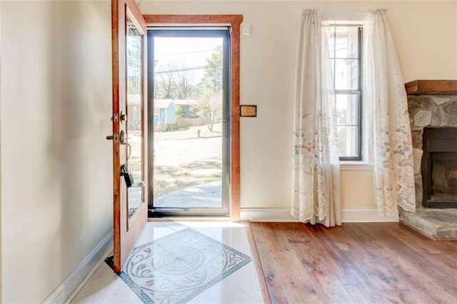 2211 Jonathan Ave, Lithonia, GA 30058 - entrance foyer with healthy amount of natural light, wood finished floors, and baseboards