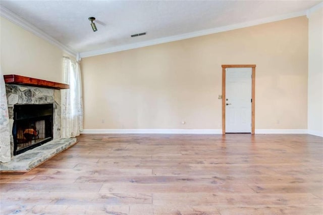2211 Jonathan Ave, Lithonia, GA 30058 - unfurnished living room featuring ornamental molding, a fireplace, light wood-style floors, and baseboards