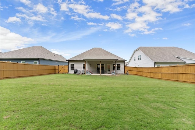 back of property with a patio