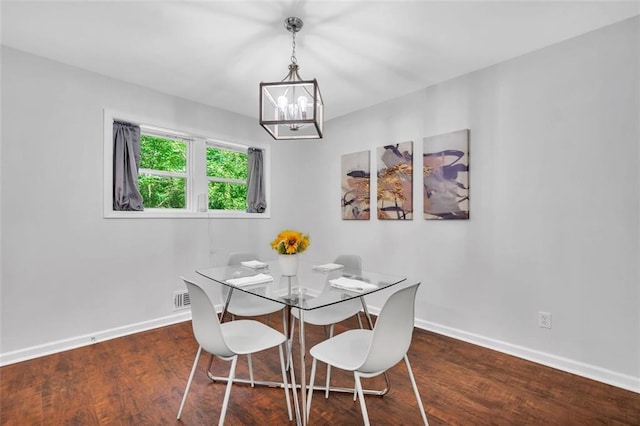 1893 Burning Tree Dr, Decatur, GA 30032 - dining space with visible vents, wood finished floors, baseboards, and a chandelier