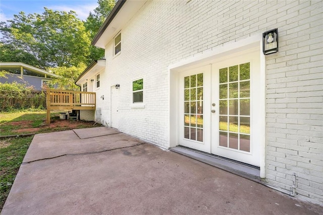 1893 Burning Tree Dr, Decatur, GA 30032 - view of patio / terrace with french doors and a wooden deck