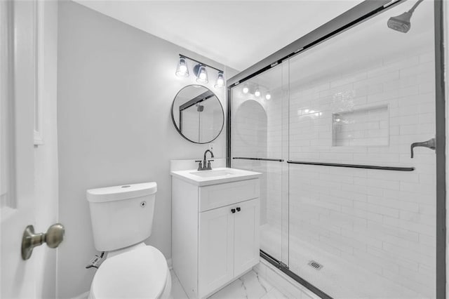 1893 Burning Tree Dr, Decatur, GA 30032 - full bathroom with vanity, a shower stall, toilet, and marble finish floor