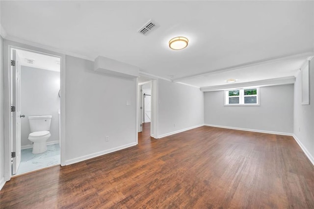 1893 Burning Tree Dr, Decatur, GA 30032 - below grade area featuring visible vents, baseboards, and wood finished floors