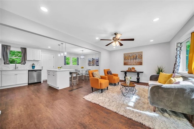 1893 Burning Tree Dr, Decatur, GA 30032 - living room with dark wood finished floors, recessed lighting, and a healthy amount of sunlight