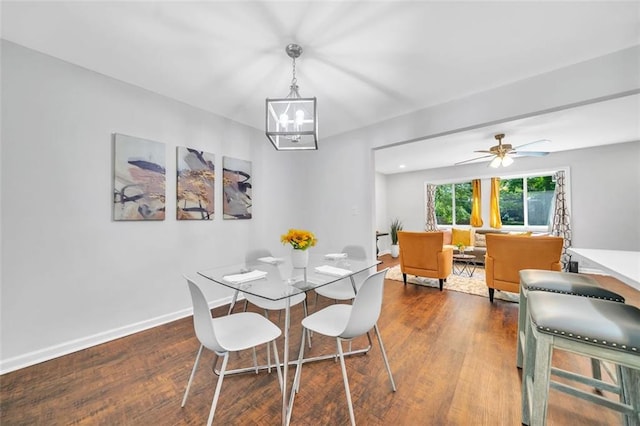1893 Burning Tree Dr, Decatur, GA 30032 - dining area with baseboards, dark wood-style floors, and ceiling fan with notable chandelier