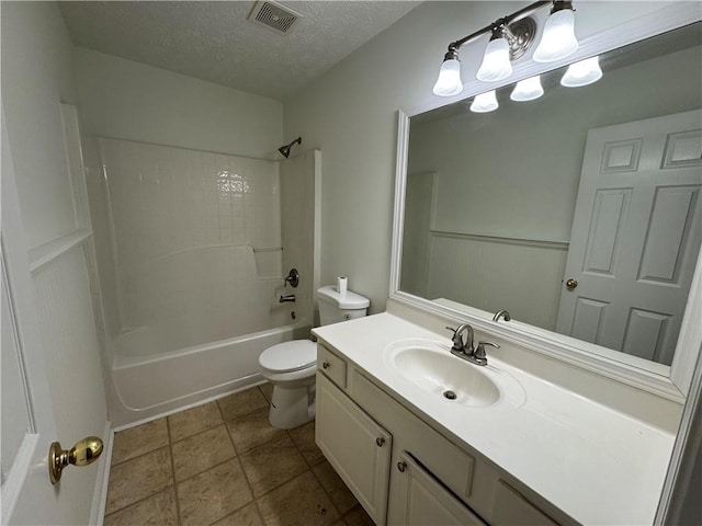 full bathroom with a textured ceiling, toilet, vanity, visible vents, and  shower combination