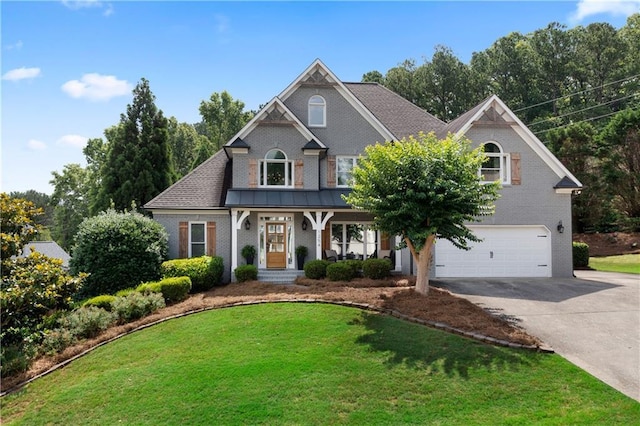 1254 Hadaway Garden Dr NW, Kennesaw, GA 30152 - view of front facade featuring concrete driveway, an attached garage, brick siding, and a front yard
