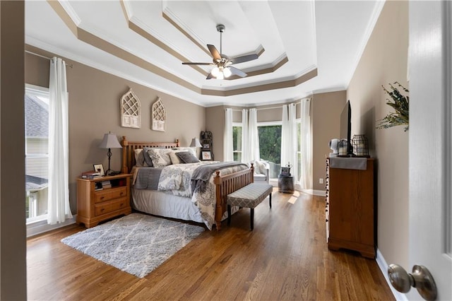 1254 Hadaway Garden Dr NW, Kennesaw, GA 30152 - bedroom featuring a raised ceiling, crown molding, and wood finished floors