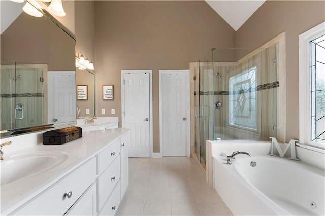 1254 Hadaway Garden Dr NW, Kennesaw, GA 30152 - bathroom with a shower stall, double vanity, a bath, high vaulted ceiling, and tile patterned flooring