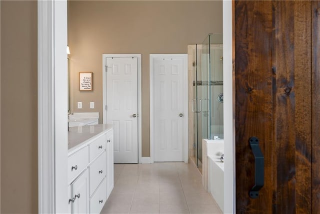 1254 Hadaway Garden Dr NW, Kennesaw, GA 30152 - bathroom featuring a stall shower, tile patterned floors, vanity, and a bath