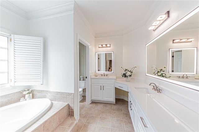 bathroom featuring toilet, ornamental molding, and a sink
