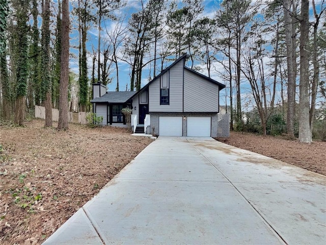 split level home with a garage