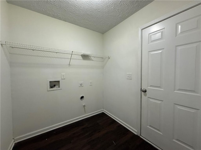 washroom featuring laundry area, baseboards, dark wood finished floors, washer hookup, and electric dryer hookup