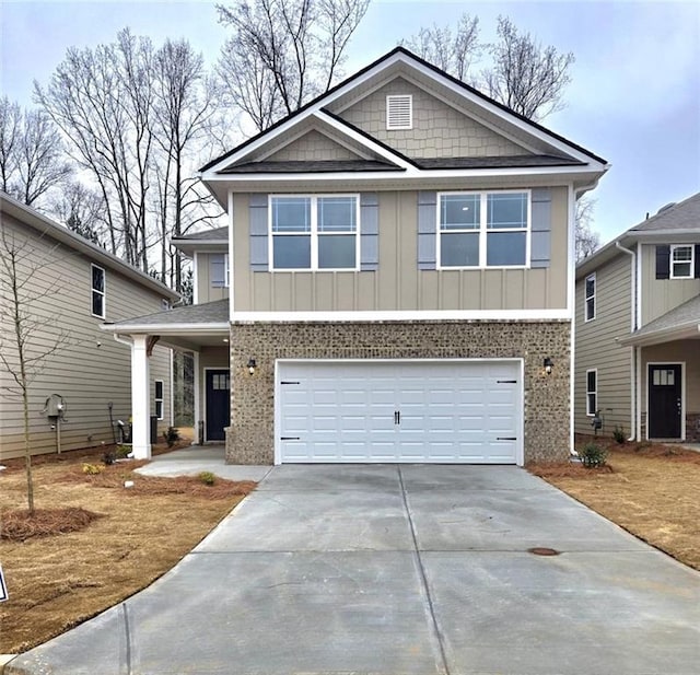 view of front of property with a garage