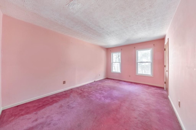 350 Pleasant Oak Ct SW, Marietta, GA 30008 - empty room featuring a textured ceiling, baseboards, and carpet floors
