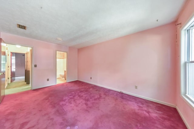 350 Pleasant Oak Ct SW, Marietta, GA 30008 - unfurnished bedroom featuring carpet flooring, baseboards, multiple windows, and ensuite bath