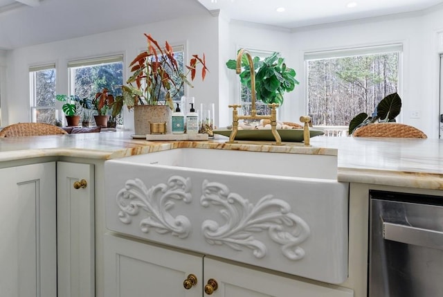 details featuring wine cooler, recessed lighting, and light countertops