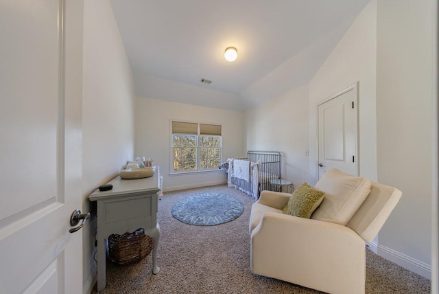 carpeted bedroom featuring visible vents and baseboards