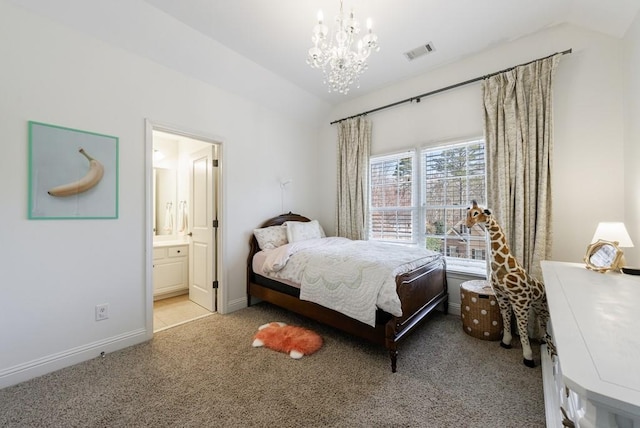 carpeted bedroom with visible vents, ensuite bath, an inviting chandelier, baseboards, and vaulted ceiling