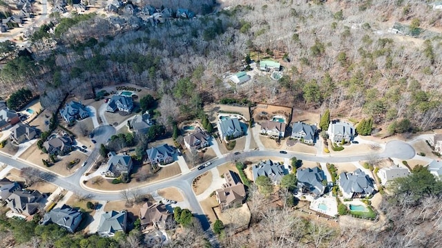 birds eye view of property with a residential view