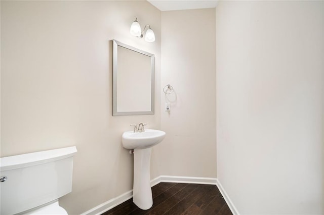 212 Jetta Cir, Mcdonough, GA 30253 - bathroom with toilet, baseboards, and hardwood / wood-style flooring