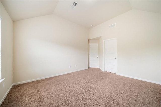 212 Jetta Cir, Mcdonough, GA 30253 - empty room featuring lofted ceiling, carpet, and baseboards
