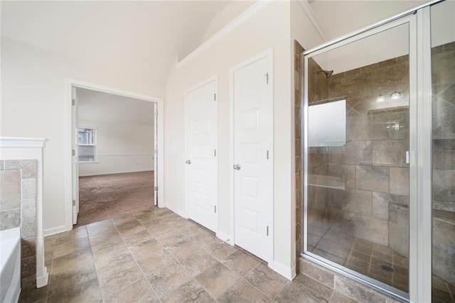 212 Jetta Cir, Mcdonough, GA 30253 - full bathroom featuring a shower stall, stone finish floors, baseboards, and a tub to relax in