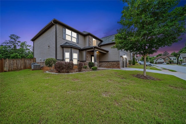 212 Jetta Cir, Mcdonough, GA 30253 - view of front of property with driveway, brick siding, a garage, and central AC unit