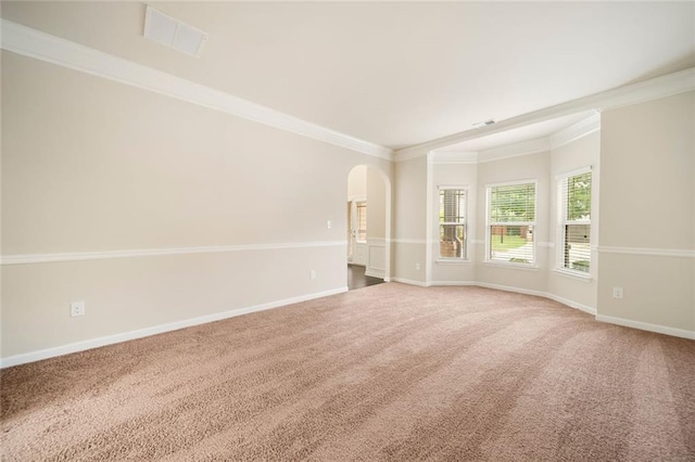 212 Jetta Cir, Mcdonough, GA 30253 - unfurnished room featuring crown molding, carpet flooring, arched walkways, and baseboards