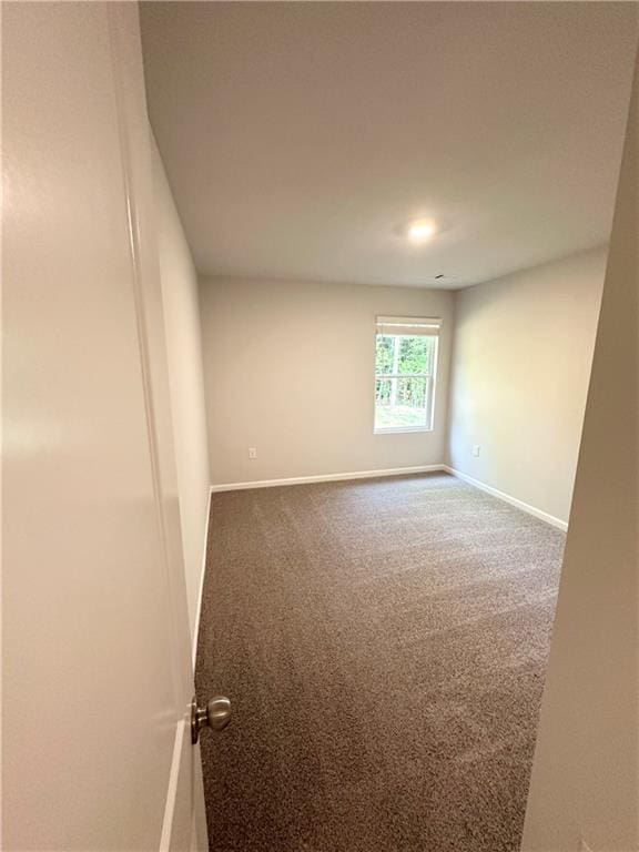 321 Lambert Overlook Cir, Carrollton, GA 30117 - carpeted spare room with baseboards