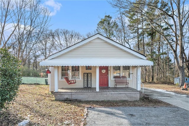 bungalow featuring covered porch