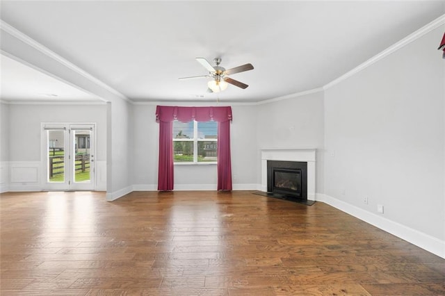 6535 Crosscreek Ln, Flowery Branch, GA 30542 - unfurnished living room with ceiling fan, a fireplace with flush hearth, hardwood / wood-style floors, and crown molding