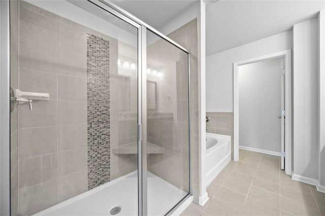 6535 Crosscreek Ln, Flowery Branch, GA 30542 - full bathroom with a stall shower, a bath, and tile patterned floors