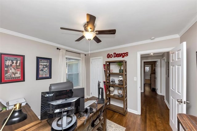 home office with ornamental molding, ceiling fan, and dark hardwood / wood-style flooring