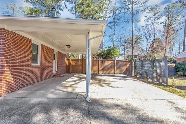 view of patio / terrace featuring a carport