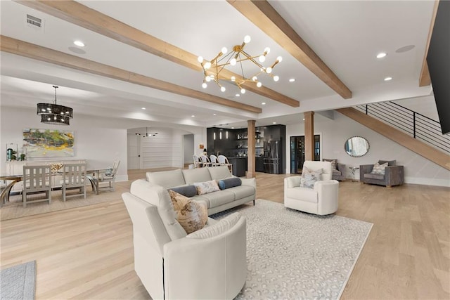 living area with recessed lighting, beamed ceiling, a notable chandelier, and light wood finished floors