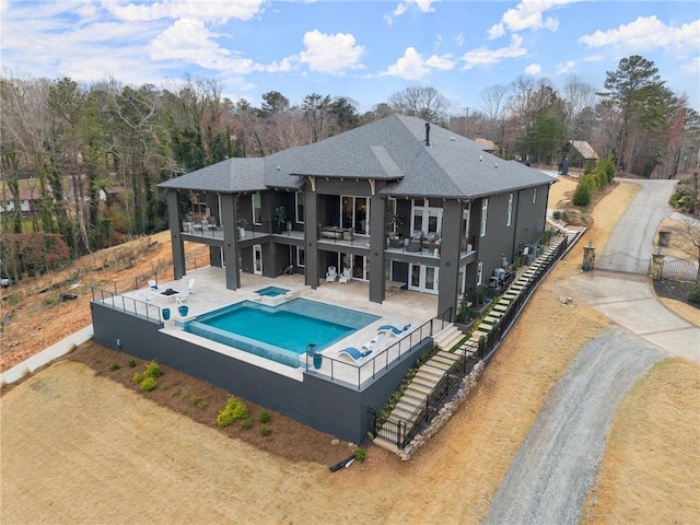 back of house with a patio, a balcony, and fence private yard