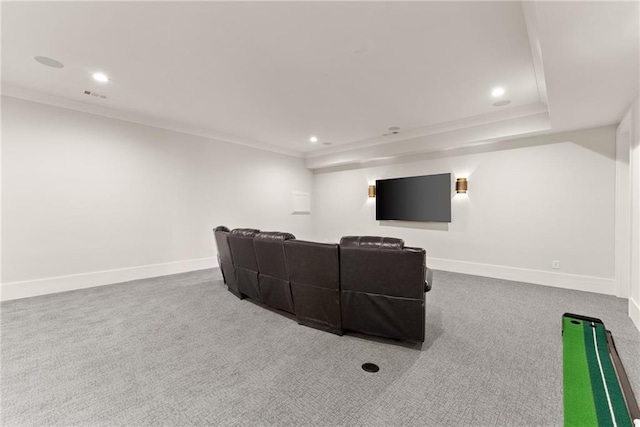 carpeted home theater room featuring crown molding, recessed lighting, and baseboards