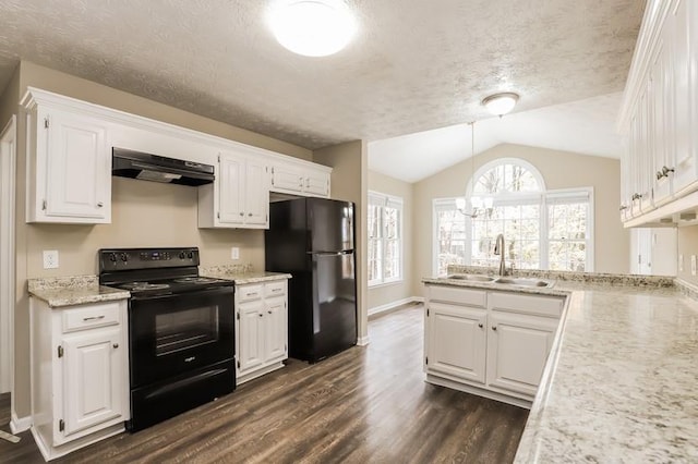 kitchen with white cabinetry, sink, pendant lighting, and black appliances