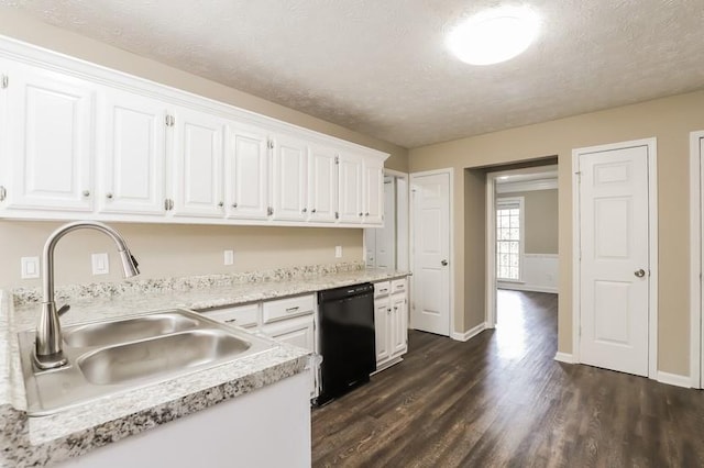 kitchen featuring white cabinetry, dark hardwood / wood-style flooring, black dishwasher, and sink