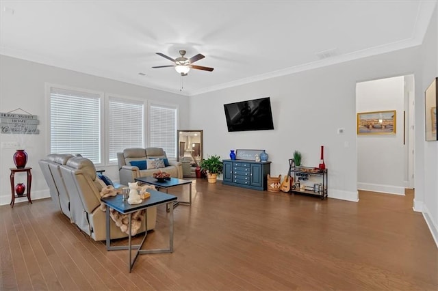 living room featuring crown molding, hardwood / wood-style flooring, and ceiling fan