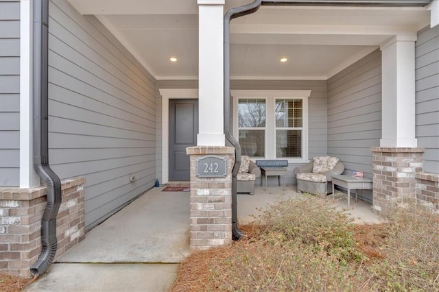 property entrance featuring covered porch